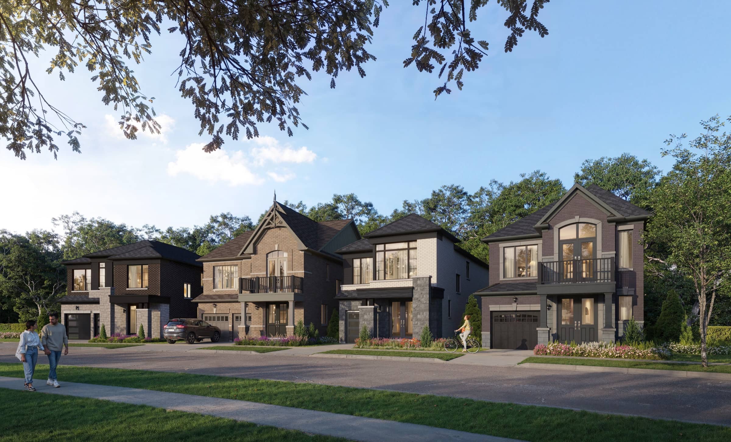 Street of stone and brick detached homes with gabled rooflines and mature trees