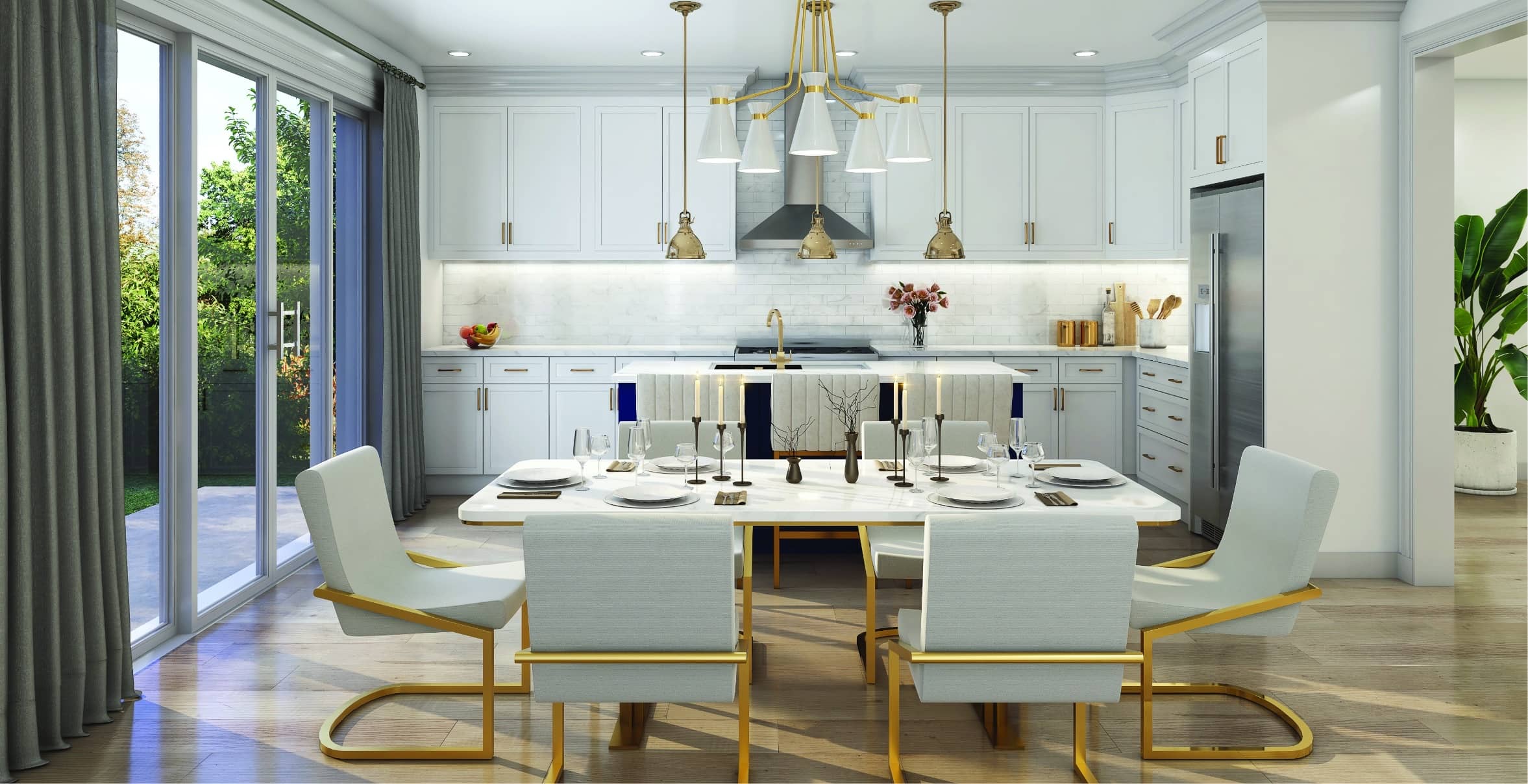 White kitchen with dining table under brass pendants and floor-to-ceiling sliding doors